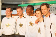 5-A-SIDE. Image shows from L to R: Nick (Michael Nardone), Johnny (Keith Duffy), Matt (Olajide Olatunji), Richard (Ceallach Spellman), Lee (Paul Sculfor). Copyright: Emerald Films