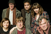 The Alternative Comedy Experience. Image shows from L to R: Josie Long, Simon Munnery, David Kay, Paul Sinha, Bridget Christie, Stewart Lee. Copyright: Comedy Central