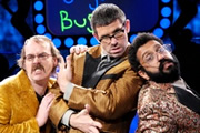 The Angelos Epithemiou Show. Image shows from L to R: Kenny (Seymour Mace), Angelos Epithemiou (Dan Skinner), Gupta (Adeel Akhtar). Copyright: Pett Productions