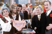 Are You Being Served?. Image shows from L to R: Mrs. Betty Slocombe (Mollie Sugden), Miss Shirley Brahms (Wendy Richard), Mr. Dick Lucas (Trevor Bannister), Mr. Cuthbert Rumbold (Nicholas Smith), Mr. Mash (Larry Martyn), Mr. Ernest Grainger (Arthur Brough), Mr. Wilberforce Humphries (John Inman), Captain Stephen Peacock (Frank Thornton). Copyright: BBC