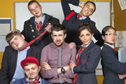 Bad Education. Image shows from L to R: Joe (Ethan Lawrence), Rem Dogg (Jack Binstead), Mitchell (Charlie Wernham), Alfie (Jack Whitehall), Stephen (Layton Williams), Chantelle (Nikki Runeckles), Jing (Kae Alexander). Copyright: Tiger Aspect Productions