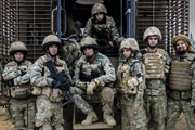 Bluestone 42. Image shows from L to R: Bird (Katie Lyons), Simon (Stephen Wight), Nick (Oliver Chris), Towerblock (Matthew Lewis), Mary (Kelly Adams), Lt Col Smith (Tony Gardner), Faruq (Keeno Lee Hector). Copyright: BBC