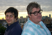 Comedy Exchange. Image shows from L to R: Eugene Mirman, Phill Jupitus. Copyright: Tiger Aspect Productions