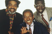 Desmond's. Image shows from L to R: Porkpie (Ram John Holder), Desmond (Norman Beaton), Matthew (Gyearbuor Asante). Copyright: Humphrey Barclay Productions