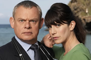 Doc Martin. Image shows from L to R: Dr Martin Ellingham (Martin Clunes), Louisa Glasson (Caroline Catz). Copyright: Buffalo Pictures / Homerun Productions