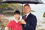 Doc Martin. Image shows from L to R: Louisa Glasson (Caroline Catz), Dr Martin Ellingham (Martin Clunes). Copyright: Buffalo Pictures / Homerun Productions