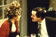 Fawlty Towers. Image shows from L to R: Sybil Fawlty (Prunella Scales), Basil Fawlty (John Cleese). Copyright: BBC