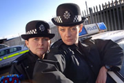 Feel The Force. Image shows from L to R: Sally Frank (Rosie Cavaliero), Sally Bobbins (Michelle Gomez). Copyright: Catherine Bailey Productions Limited