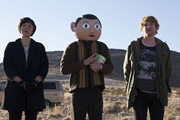 Frank. Image shows from L to R: Clara (Maggie Gyllenhaal), Frank Sidebottom (Michael Fassbender), Jon Burroughs (Domhnall Gleeson). Copyright: Film4