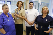 Getting On. Image shows from L to R: Nurse Kim Wilde (Jo Brand), Doctor Pippa Moore (Vicki Pepperdine), Hilary Loftus (Ricky Grover), Sister Den Flixter (Joanna Scanlan). Copyright: Vera Productions