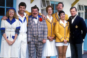 Hi-De-Hi!. Image shows from L to R: Peggy Ollerenshaw (Su Pollard), Spike Dixon (Jeffrey Holland), Ted Bovis (Paul Shane), Yvonne Stuart-Hargreaves (Diane Holland), Julian Dalrymple-Sykes (Ben Aris), Gladys Pugh (Ruth Madoc), Sqdn-Ldr Clive Dempster DFC (David Griffin). Copyright: BBC