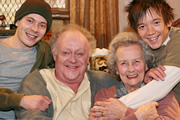 High Hopes. Image shows from L to R: Charlie (Oliver Wood), Fagin (Robert Blythe), Mam (Margaret John), Hoffman (Steven Meo). Copyright: BBC