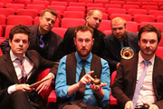 Alex Horne Presents The Horne Section. Image shows from L to R: Drums (Ben Reynolds), Saxophone (Mark Brown), Alex Horne, Bass (Will Collier), Trumpet (Joe Auckland), Ed Sheldrake. Copyright: BBC