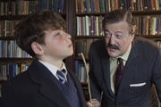 Little Crackers. Image shows from L to R: Fry (Daniel Roche), Headmaster (Stephen Fry)