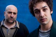 Little Crackers. Image shows from L to R: Tobacconist (Omid Djalili), Omid (Ashley Kumar)