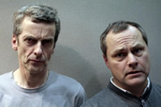 The News At Bedtime. Image shows from L to R: Jim Tweedledee (Peter Capaldi), John Tweedledum (Jack Dee). Copyright: BBC