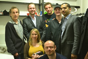 No Pressure To Be Funny - Series 2, Episode 6. Image shows from L to R: Nick Revell, James O'Brien, Tiffany Stevenson, Henning Wehn, Alistair Barrie, Paul Thorne, Mehdi Hasan