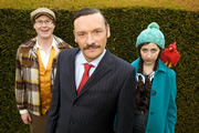 Penelope Princess Of Pets. Image shows from L to R: Kyle (Kurt Braunohler), Thomas Stone MP (Julian Barratt), Penelope (Kristen Schaal). Copyright: Avalon Television