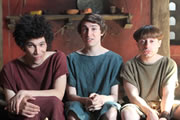 Plebs. Image shows from L to R: Stylax (Joel Fry), Marcus (Tom Rosenthal), Grumio (Ryan Sampson). Copyright: RISE Films