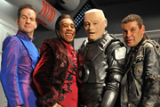 Red Dwarf. Image shows from L to R: Rimmer (Chris Barrie), Cat (Danny John-Jules), Kryten (Robert Llewellyn), Lister (Craig Charles). Copyright: Grant Naylor Productions / BBC