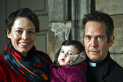 Rev.. Image shows from L to R: Alex Smallbone (Olivia Colman), Rev Adam Smallbone (Tom Hollander). Copyright: Big Talk Productions