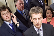 The Thick Of It. Image shows from L to R: Oliver Reeder (Chris Addison), Glenn Cullen (James Smith), Malcolm Tucker (Peter Capaldi), Terri Coverley (Joanna Scanlan). Copyright: BBC