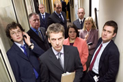 The Thick Of It. Image shows from L to R: Oliver Reeder (Chris Addison), Glenn Cullen (James Smith), Malcolm Tucker (Peter Capaldi), Terri Coverley (Joanna Scanlan), Robyn Murdoch (Polly Kemp), Jamie (Paul Higgins). Copyright: BBC