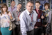 Twenty Twelve. Image shows from L to R: Siobhan Sharpe (Jessica Hynes), Nick Jowett (Vincent Franklin), Graham Hitchins (Karl Theobald), Ian Fletcher (Hugh Bonneville), Daniel Stroud (Samuel Barnett), Kay Hope (Amelia Bullmore). Copyright: BBC