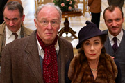 Wodehouse In Exile. Image shows from L to R: Mackintosh (Paul Ritter), P.G. Wodehouse (Tim Pigott-Smith), Ethel Wodehouse (Zoë Wanamaker), Werner Plack (Richard Dormer). Copyright: Great Meadow Productions