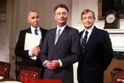 Yes, Prime Minister. Image shows from L to R: Sir Humphrey Appleby (Nigel Hawthorne), James Hacker (Paul Eddington), Bernard Woolley (Derek Fowlds). Copyright: BBC