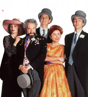 Four Weddings And A Funeral. Image shows from L to R: Fiona (Kristin Scott Thomas), Gareth (Simon Callow), Tom (James Fleet), Scarlet (Charlotte Coleman), Matthew (John Hannah). Copyright: Working Title Films / Metro-Goldwyn-Mayer