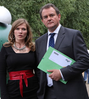 Twenty Twelve. Image shows from L to R: Siobhan Sharpe (Jessica Hynes), Ian Fletcher (Hugh Bonneville). Copyright: BBC