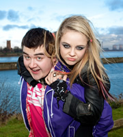 Two Pints Of Lager And A Packet Of Crisps. Image shows from L to R: Tim (Luke Gell), Cassie (Georgia Henshaw). Copyright: BBC