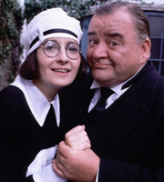 You Rang, M'Lord?. Image shows from L to R: Ivy Teasdale (Su Pollard), Alfred 'Alf' Stokes (Paul Shane). Copyright: BBC