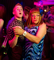 Benidorm. Image shows from L to R: Liam (Adam Gillen), Les / Lesley (Tim Healy). Copyright: Tiger Aspect Productions