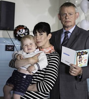 Doc Martin. Image shows from L to R: Louisa Glasson (Caroline Catz), Dr Martin Ellingham (Martin Clunes). Copyright: Buffalo Pictures / Homerun Productions