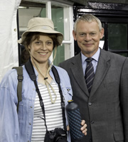 Doc Martin. Image shows from L to R: Beth Traywick (Sigourney Weaver), Dr Martin Ellingham (Martin Clunes). Copyright: Buffalo Pictures / Homerun Productions