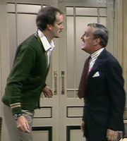 Fawlty Towers. Image shows from L to R: Basil Fawlty (John Cleese), Mr. Hutchinson (Bernard Cribbins). Copyright: BBC