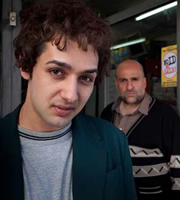 Little Crackers. Image shows from L to R: Omid (Ashley Kumar), Tobacconist (Omid Djalili)