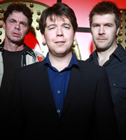 Live At The Apollo. Image shows from L to R: Rich Hall, Michael McIntyre, Rhod Gilbert. Copyright: Open Mike Productions