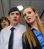 Lunch Monkeys. Image shows from L to R: Kenny Graham (Christian Foster), Darrel Wadsworth (Chris Hannon), Tania MacGuire (Jessica Hall). Copyright: Channel K / BBC