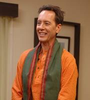 Mumbai Calling. Benedict Harlow (Richard E. Grant). Copyright: Allan McKeown Presents