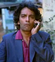 Mumbai Calling. Vijay (Vrajesh Hirji). Copyright: Allan McKeown Presents