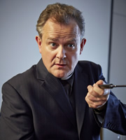 Rev.. Roland Wise (Hugh Bonneville). Copyright: Big Talk Productions