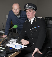 Scot Squad. Image shows from L to R: Fred MacAulay, Chief Commissioner Cameron Miekelson (Jack Docherty). Copyright: The Comedy Unit