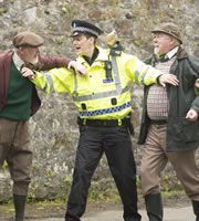 Scot Squad. Image shows left to right: Hunter MacDonald (Sean Scanlan), PC Charlie McIntosh (Chris Forbes), Calder Campbell (Michael MacKenzie). Credit: The Comedy Unit