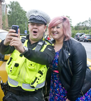 Scot Squad. Image shows left to right: PC Hugh McKirdy (Graeme Stevely), Michelle McManus. Credit: The Comedy Unit