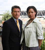 Twenty Twelve. Image shows from L to R: Sebastian Coe, Nina (Nina Sosanya). Copyright: BBC