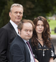 You, Me & Them. Image shows from L to R: Ed Walker (Anthony Head), Mike (Kenneth Collard), Lauren Grey (Eve Myles). Copyright: Hat Trick Productions