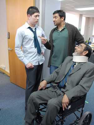 Lunch Monkeys. Image shows from L to R: Asif Khan (Abdullah Afzal), Mohammed Khan (Kulvinder Ghir), Mr. Ahmed (Mohammed Rafique). Copyright: Channel K / BBC